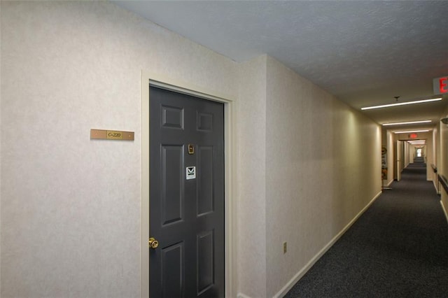 hallway with carpet