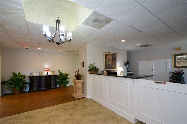 reception area with a chandelier