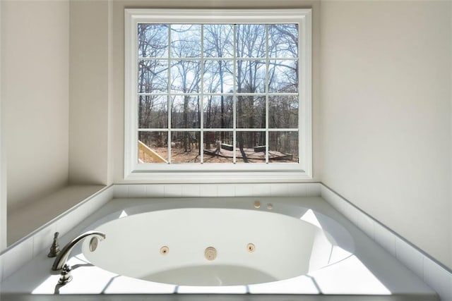 bathroom featuring a whirlpool tub