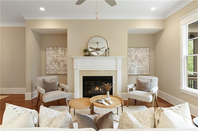 385 Windy Pines Trl, Roswell, GA 30075 - living area featuring ceiling fan, baseboards, a premium fireplace, wood finished floors, and crown molding