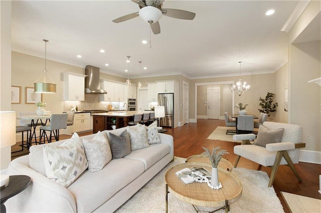 385 Windy Pines Trl, Roswell, GA 30075 - living room featuring dark wood-type flooring, a ceiling fan, baseboards, recessed lighting, and crown molding