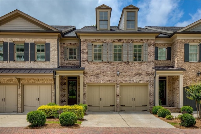 385 Windy Pines Trl, Roswell, GA 30075 - townhome / multi-family property with brick siding, a garage, and driveway