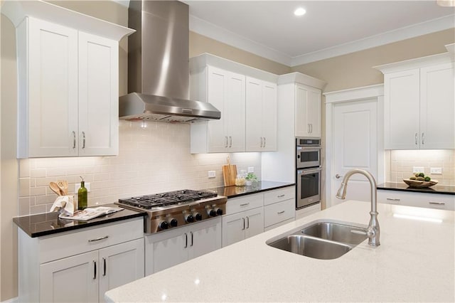 385 Windy Pines Trl, Roswell, GA 30075 - kitchen with wall chimney exhaust hood, a sink, appliances with stainless steel finishes, tasteful backsplash, and white cabinetry