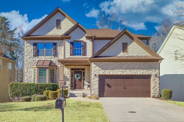 craftsman-style house with a front yard