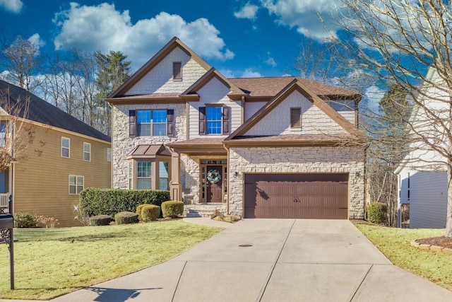 craftsman-style house with a garage and a front lawn