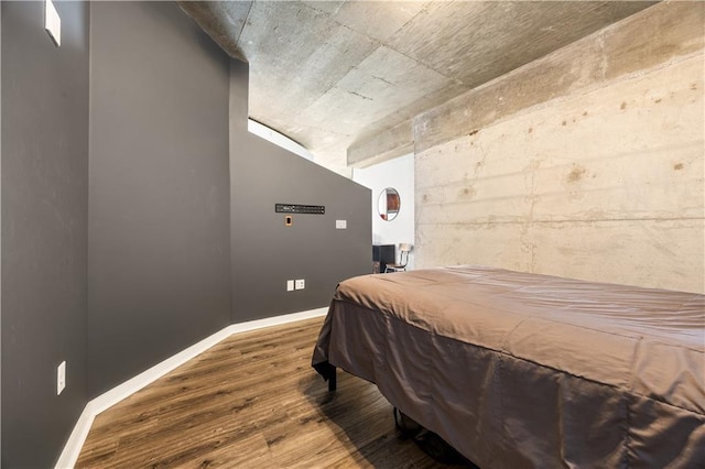 400 W Peachtree St NW Unit 3614, Atlanta, GA 30308 - bedroom with baseboards and wood finished floors