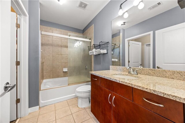 400 W Peachtree St NW Unit 3614, Atlanta, GA 30308 - bathroom featuring visible vents, toilet, tile patterned flooring, and vanity