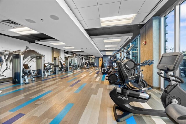400 W Peachtree St NW Unit 3614, Atlanta, GA 30308 - exercise room with visible vents and wood finished floors