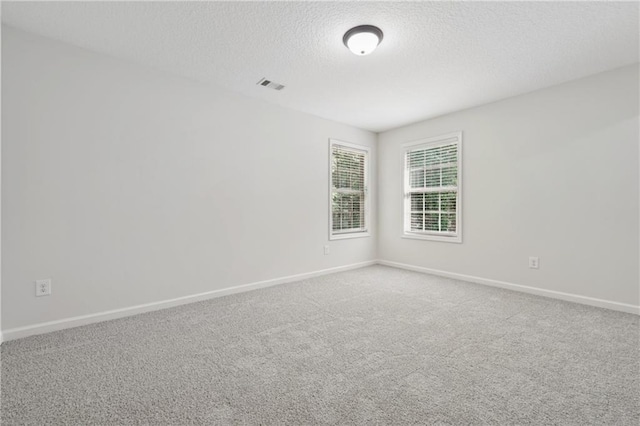 56 Sugar Leaf Ln, Jefferson, GA 30549 - unfurnished room featuring a textured ceiling and carpet flooring