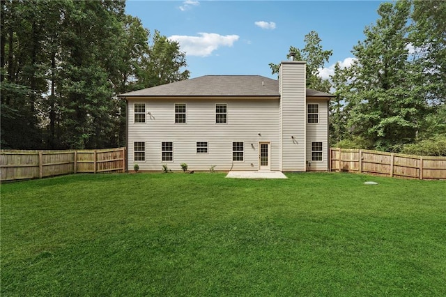 56 Sugar Leaf Ln, Jefferson, GA 30549 - rear view of house with a chimney, a fenced backyard, and a patio