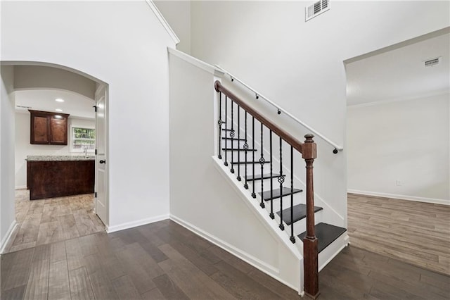 56 Sugar Leaf Ln, Jefferson, GA 30549 - stairs with wood finished floors and arched walkways