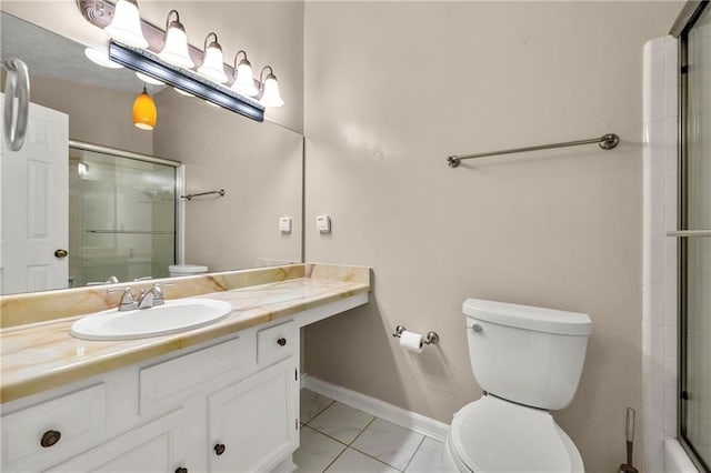 full bathroom featuring baseboards, vanity, toilet, and an enclosed shower