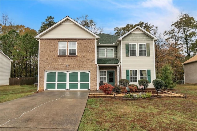 view of front facade featuring a front yard and a garage