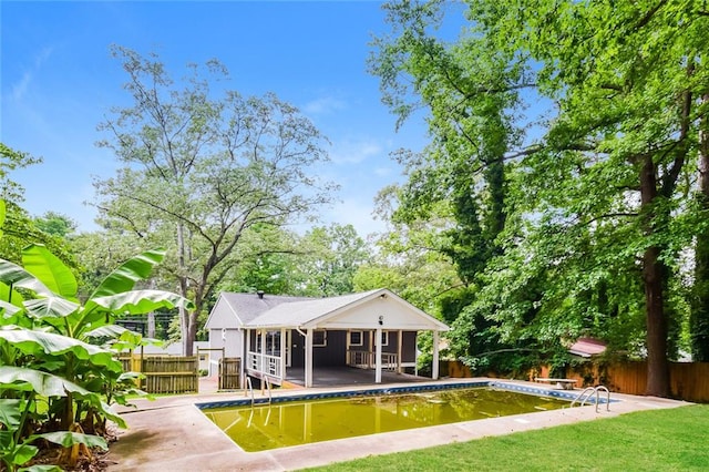 back of house with a patio area