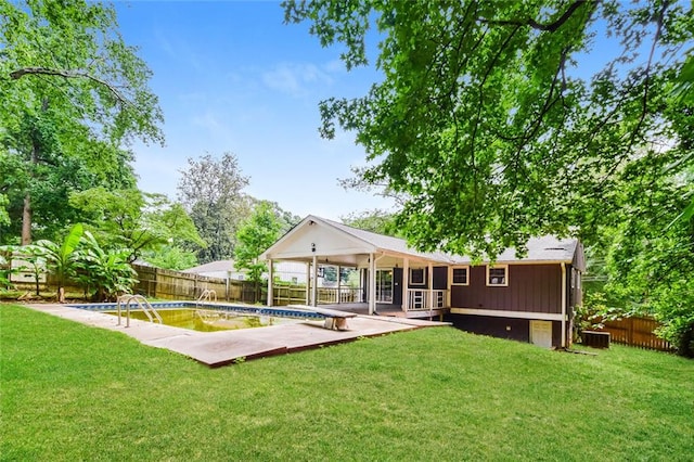 back of property with a patio