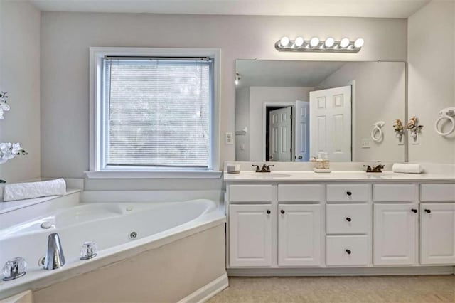 bathroom with vanity and a bathtub