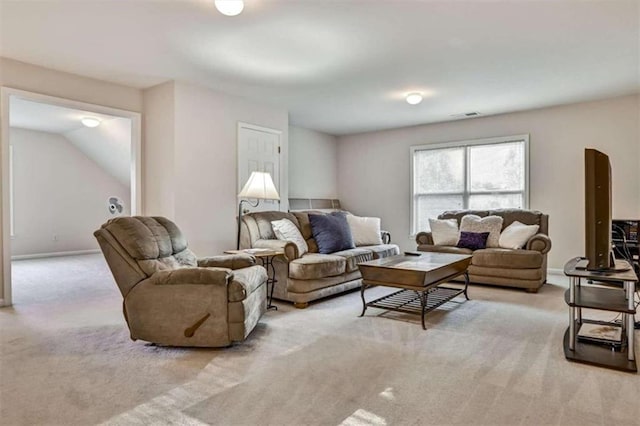 living room featuring light carpet