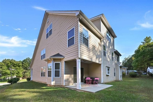 exterior space with a lawn and a patio