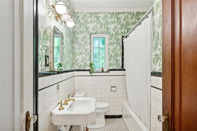 full bathroom featuring tile walls, tile flooring, shower / bath combination with curtain, and toilet