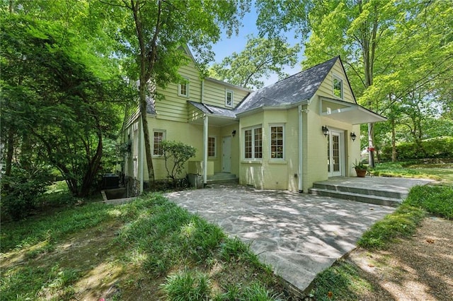 back of house with french doors