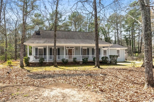 ranch-style house featuring covered porch