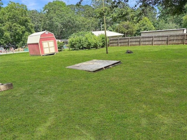 1146 Nelson St, Jackson, GA 30233 - fenced backyard featuring a storage unit