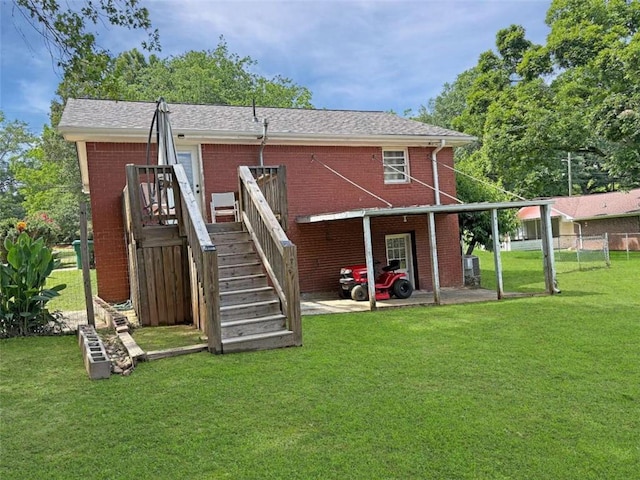 1146 Nelson St, Jackson, GA 30233 - back of property with brick siding, stairs, and a deck