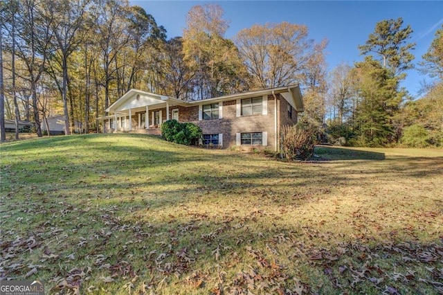 exterior space featuring a front lawn