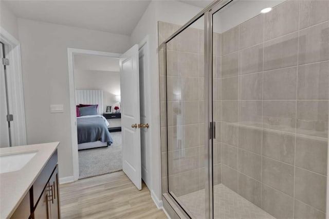 2766 Aralynn Way, College Park, GA 30337 - full bath with ensuite bathroom, wood finished floors, a shower stall, and vanity
