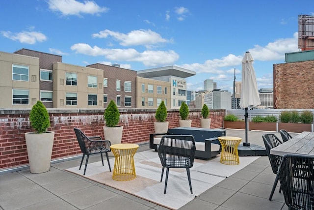 view of patio featuring a view of city