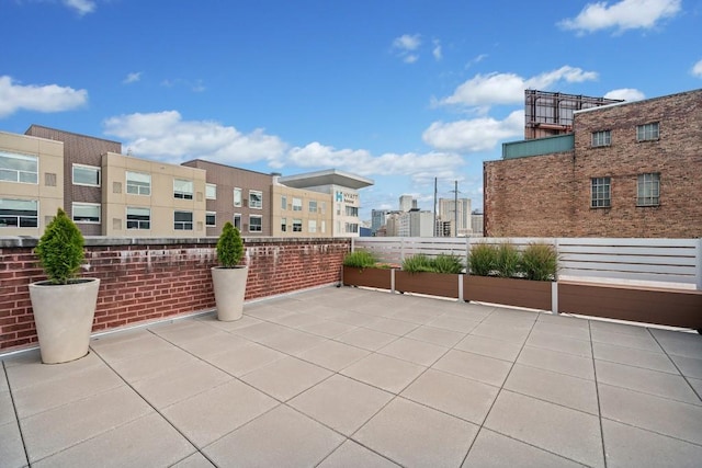 view of patio / terrace with a city view