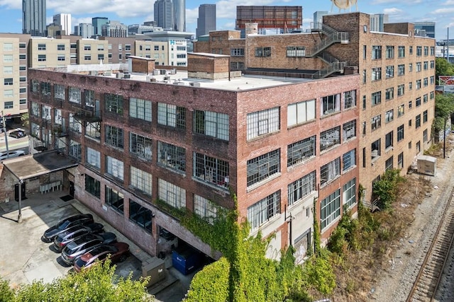 view of building exterior featuring a view of city