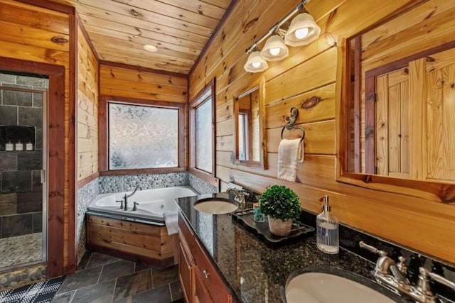 bathroom with a whirlpool tub, a shower stall, wood ceiling, and a sink