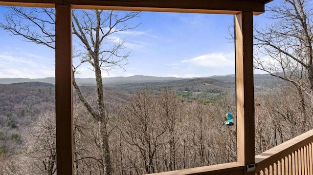 mountain view featuring a wooded view
