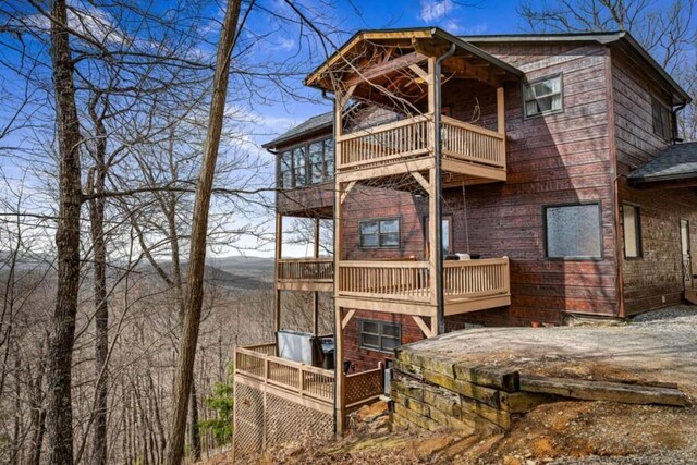 exterior space featuring a balcony