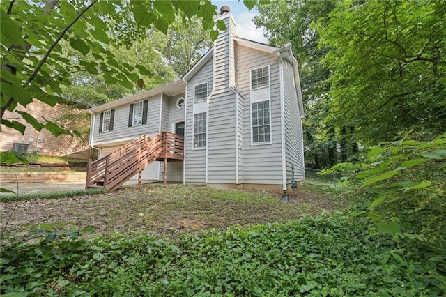 2920 Cushing Ct, Jonesboro, GA 30236 - view of front facade featuring a chimney and stairway