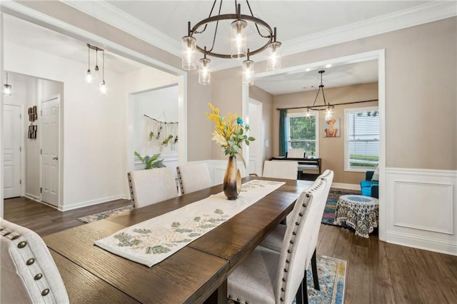 4266 Suwanee Brook Ct, Buford, GA 30518 - dining area with a chandelier, wood finished floors, a wainscoted wall, and crown molding