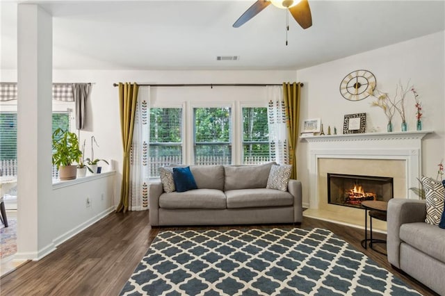 4266 Suwanee Brook Ct, Buford, GA 30518 - living room featuring wood finished floors, a ceiling fan, baseboards, and a high end fireplace