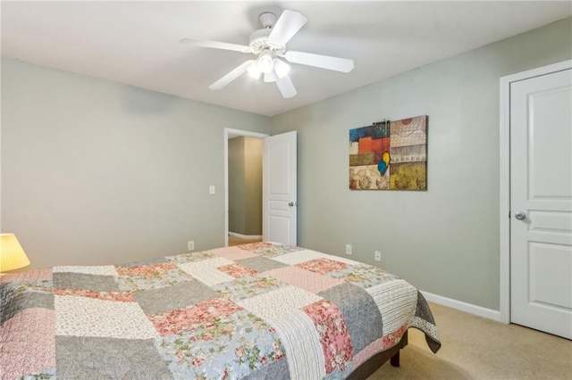 4266 Suwanee Brook Ct, Buford, GA 30518 - bedroom with light colored carpet, a ceiling fan, and baseboards