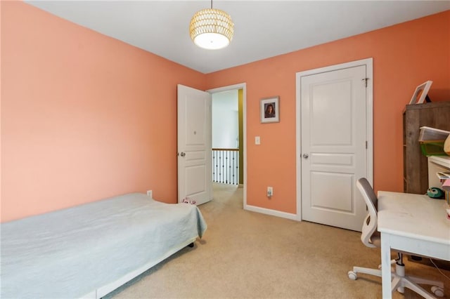 4266 Suwanee Brook Ct, Buford, GA 30518 - bedroom featuring light carpet, baseboards, and a desk