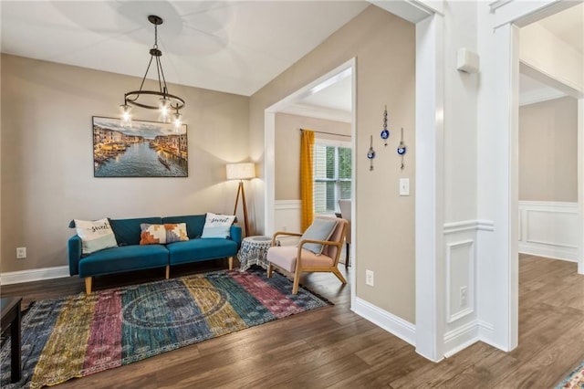 4266 Suwanee Brook Ct, Buford, GA 30518 - living area with wood finished floors, a wainscoted wall, and a decorative wall