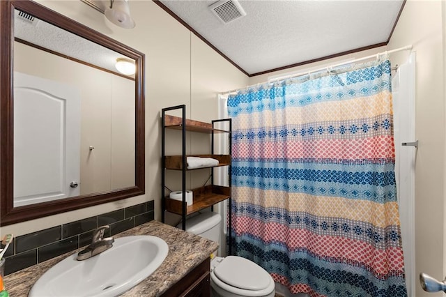 full bath with crown molding, visible vents, toilet, a textured ceiling, and vanity