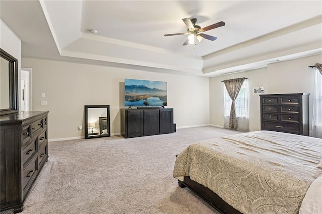 931 Sublime Trl, Canton, GA 30114 - bedroom featuring a tray ceiling, light carpet, and ceiling fan