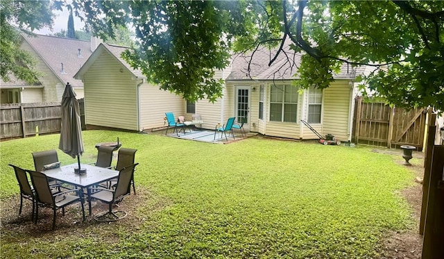 159 Misty Ridge Trl, Stockbridge, GA 30281 - back of property featuring a patio area