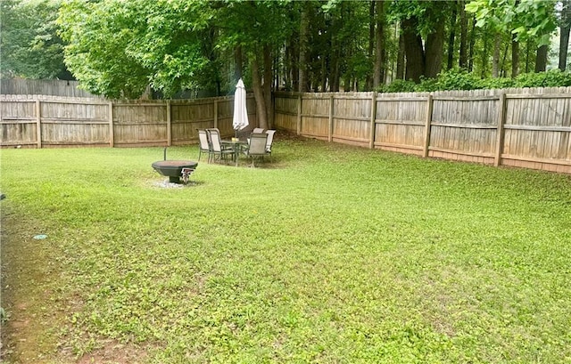 159 Misty Ridge Trl, Stockbridge, GA 30281 - view of yard with an outdoor fire pit