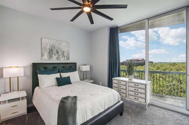 bedroom featuring carpet flooring, multiple windows, ceiling fan, and access to exterior