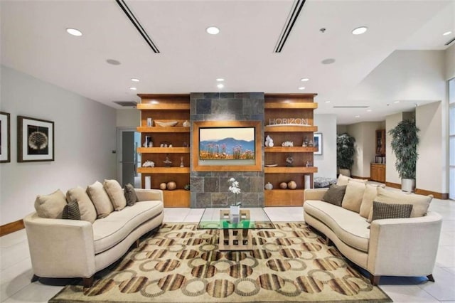 living room with built in features and light tile patterned flooring