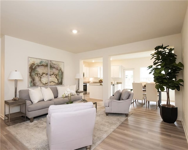 1577 Aiden Way Unit 39, Conyers, GA 30013 - living room featuring light wood-style floors and recessed lighting