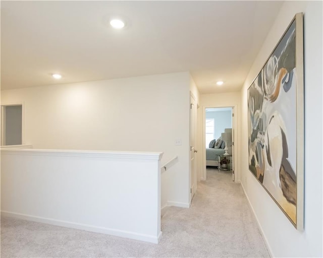 1577 Aiden Way Unit 39, Conyers, GA 30013 - corridor with light colored carpet, recessed lighting, an upstairs landing, and baseboards