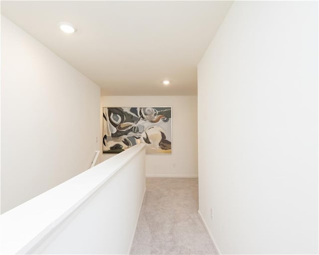 1577 Aiden Way Unit 39, Conyers, GA 30013 - corridor with light carpet, recessed lighting, an upstairs landing, and baseboards